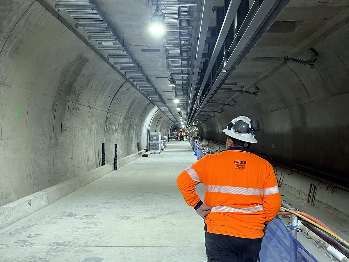 CSIS team member inspecting the tunnel